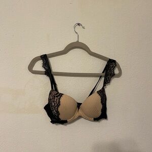 Elegant Lace Trimmed Black and Tan Bra